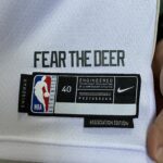 Camiseta Regata Basquete NBA - Milwaukee Bucks - Damian Lillard 0 - Association Edition 2023 - Nike - Branca - Imagem 12