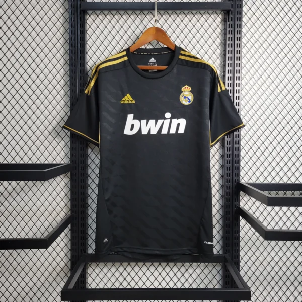 1ddc6e291-307bf87db7221c798916795943832206-1024-1024 Camisa Retrô Real Madrid Away 2011/2012 Adidas Preta - Imagem 1