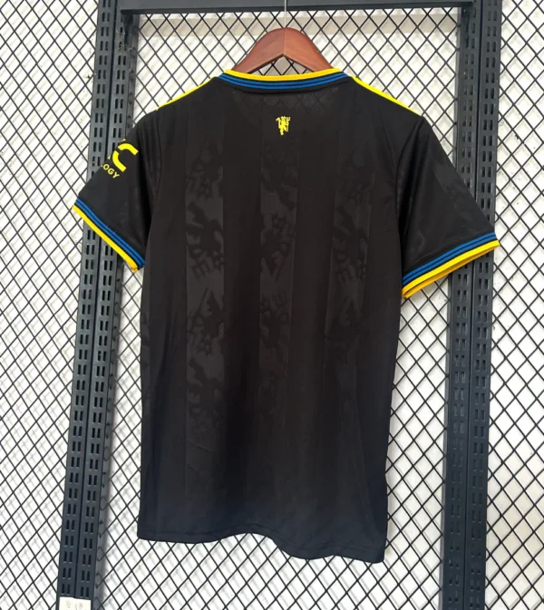 Screenshot_2025-05-31_at_11.11.38 Camisa Manchester United Third Versão Torcedor 25/2026 Adidas Preta - Imagem 2