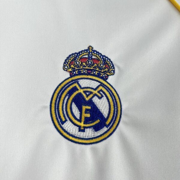 camisa-real-madrid-2526-i-home-torcedor-4-d5d4eee10dce056f0c17499258218400-1024-1024 Camisa Real Madrid Home Versão Torcedor 2025/2026 Adidas Branca - Imagem 4