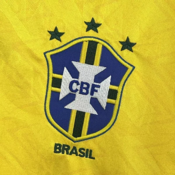 62adf7c4-403d6a7e5d42be978f17315576991445-1024-1024 Camisa Retrô Clássica Seleção Brasileira Home - Brasil Amarela – 1991 Umbro - Imagem 2
