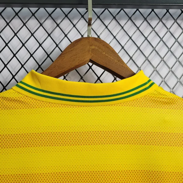 Camisa Brasil Seleção Brasileira Versão Torcedor Viagem 2022/23 Amarelo Nike - Imagem 8
