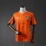 Camisa Costa do Marfim Copa do Mundo 2026 Torcedor Laranja Puma